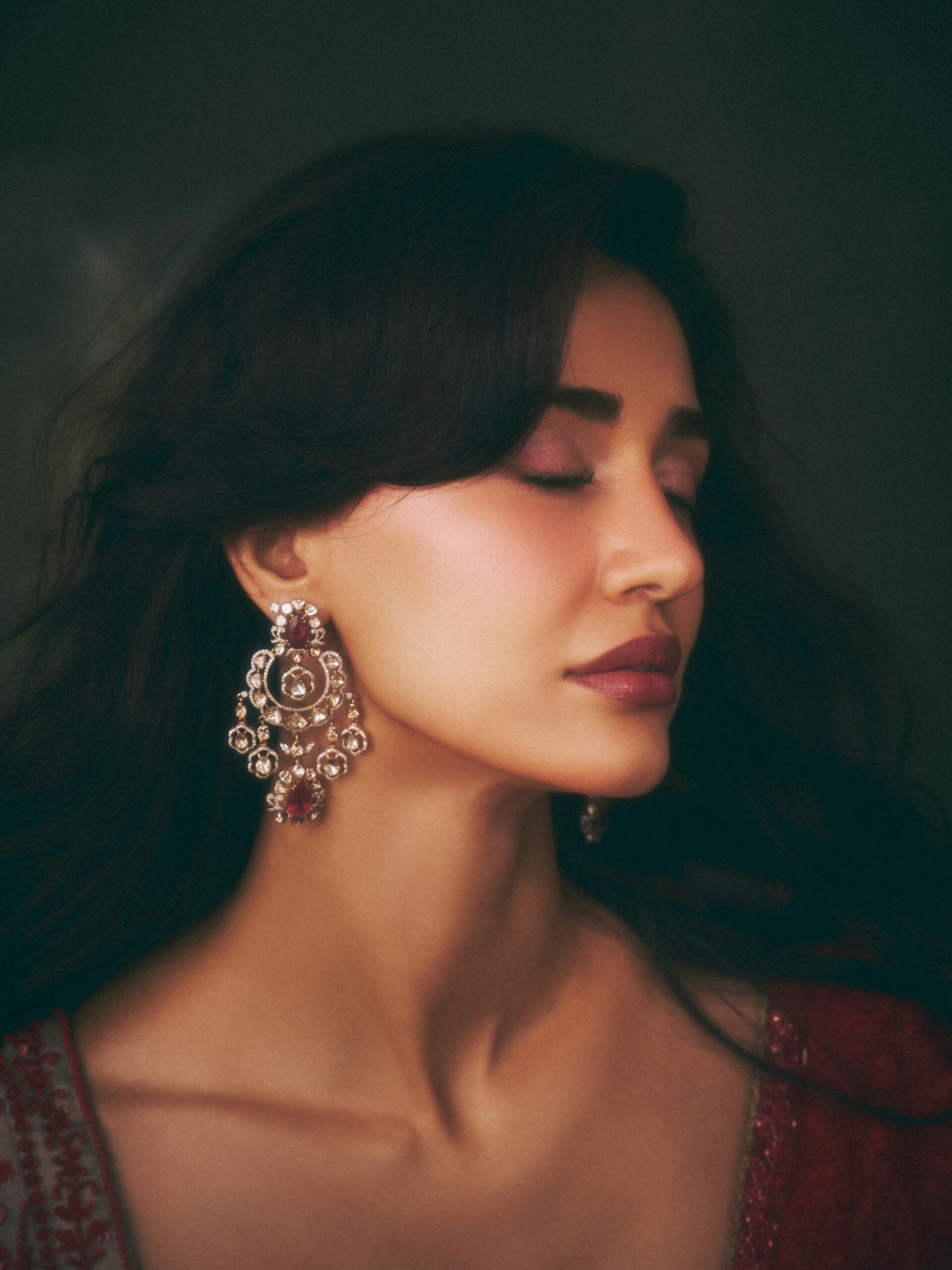 Disha Patani's Red Lehenga glamour show at Antilia Vinayaka Chavithi photos